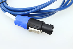Close up of a used REL Baseline Blue 3.0m Subwoofer Cable showing the connector