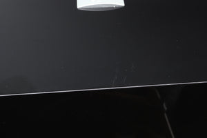 Close up view of a used REL S/3 SHO Subwoofer in Piano Black finish showing scratching on the top 
