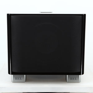 Front view of a used REL T-7X Subwoofer in a piano black finish showing the grille
