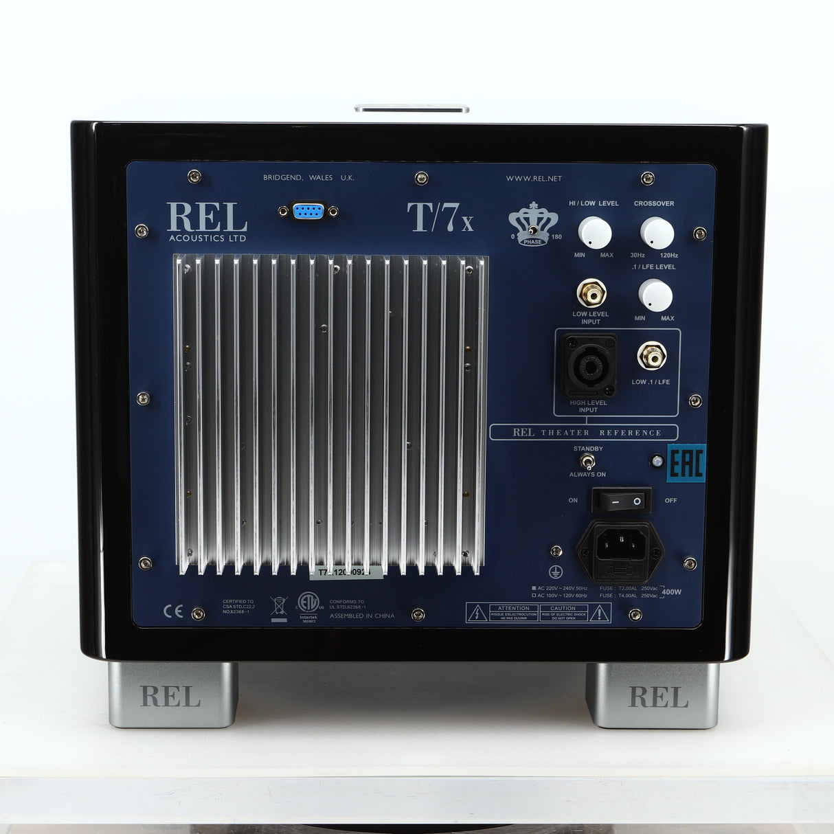Rear view of a used REL T-7X Subwoofer in a piano black finish showing Hi-Level Input and Mains Input