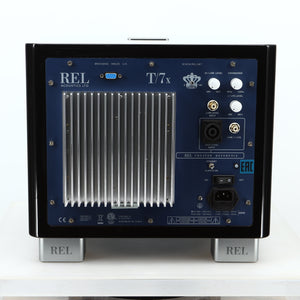 Rear view of a used REL T-7X Subwoofer in a piano black finish showing Hi-Level Input and Mains Input