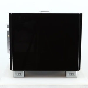 Left side view of a used REL T-7X Subwoofer in a piano black finish