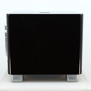Left side view of a used REL T-7X Subwoofer in a piano black finish