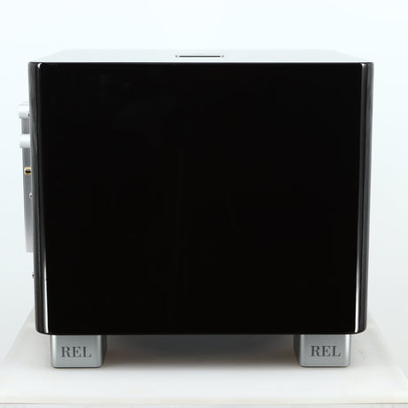 Left side view of a used REL T-7X Subwoofer in a piano black finish