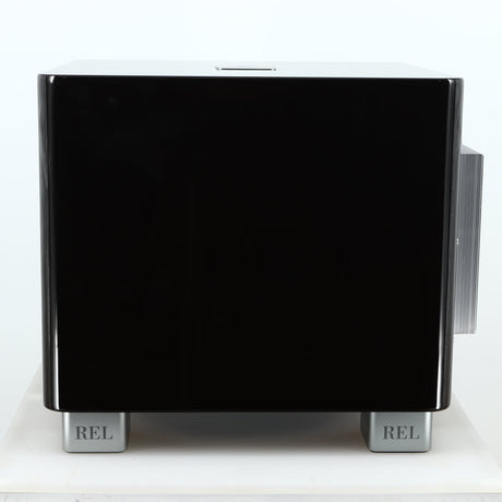 Right side view of a used REL T-7X Subwoofer in a piano black finish