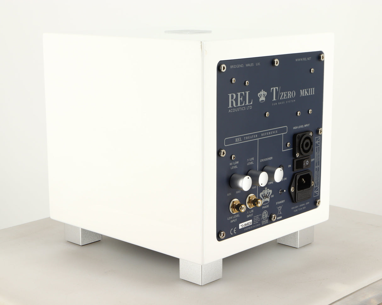 Rear right corner of a used REL T-Zero MKIII Subwoofer in a piano white finish