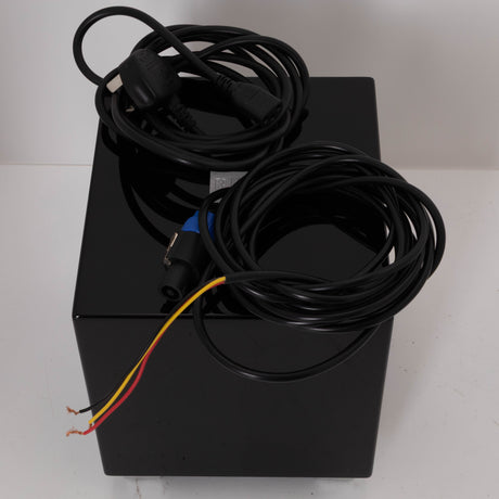Top of a used REL T-Zero Subwoofer in a Piano Black finish showing Mains Cable and Hi-Level Cable