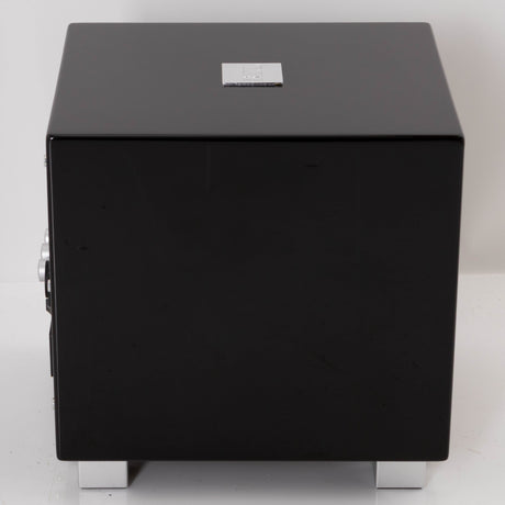 Left side view of a used REL T-Zero Subwoofer in a Piano Black finish
