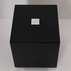 Top of a used REL T-Zero Subwoofer in a Piano Black finish