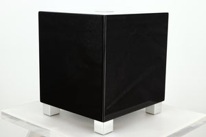 Front right corner of a REL T5i Subwoofer with a piano black finish
