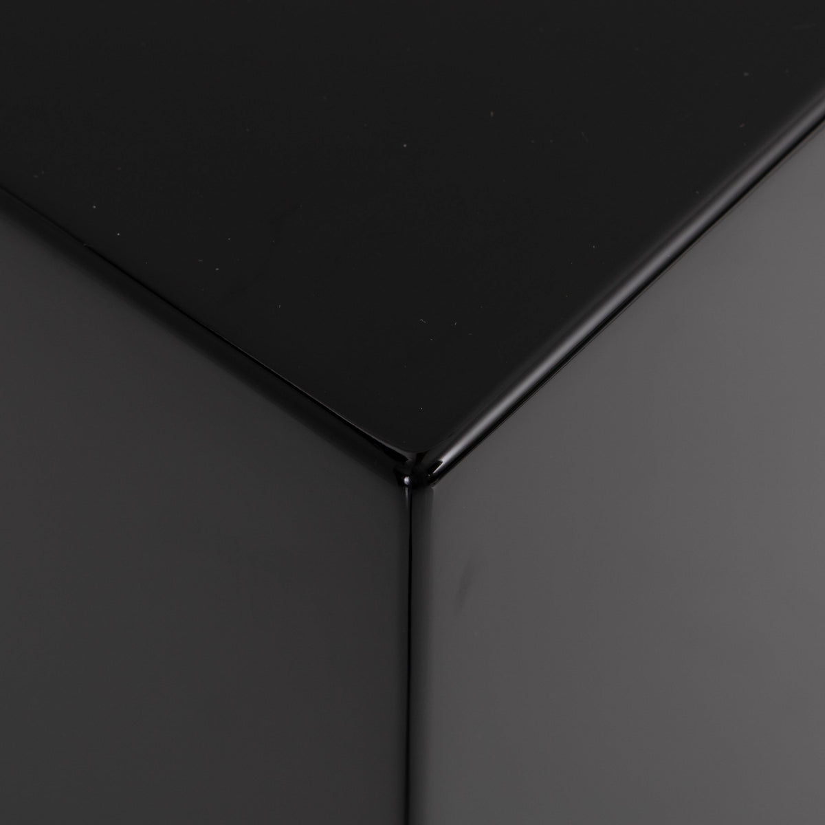 Front right corner of a used REL T5i Subwoofer in a Piano Black finish