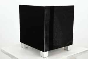 Front left corner of a REL T5i Subwoofer with a piano black finish