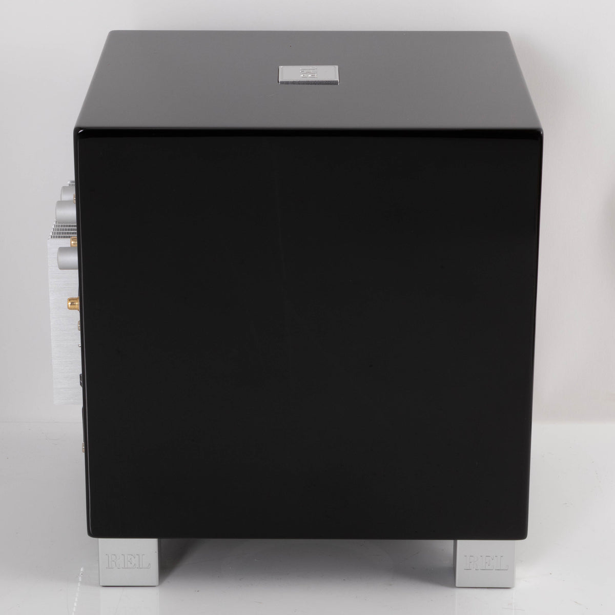 Left side view of a used REL T5i Subwoofer in a Piano Black finish