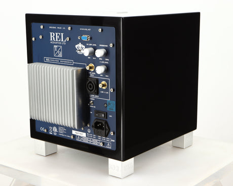 Rear left corner of a used REL T5i Subwoofer in a piano black finish