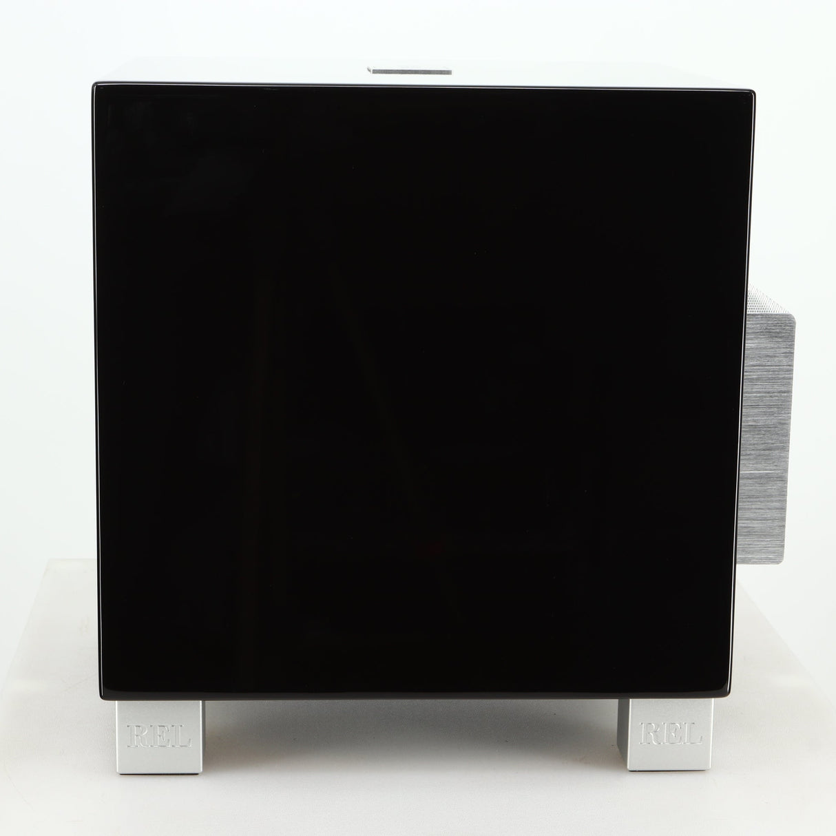 Right side view of a REL T5i Subwoofer with a piano black finish
