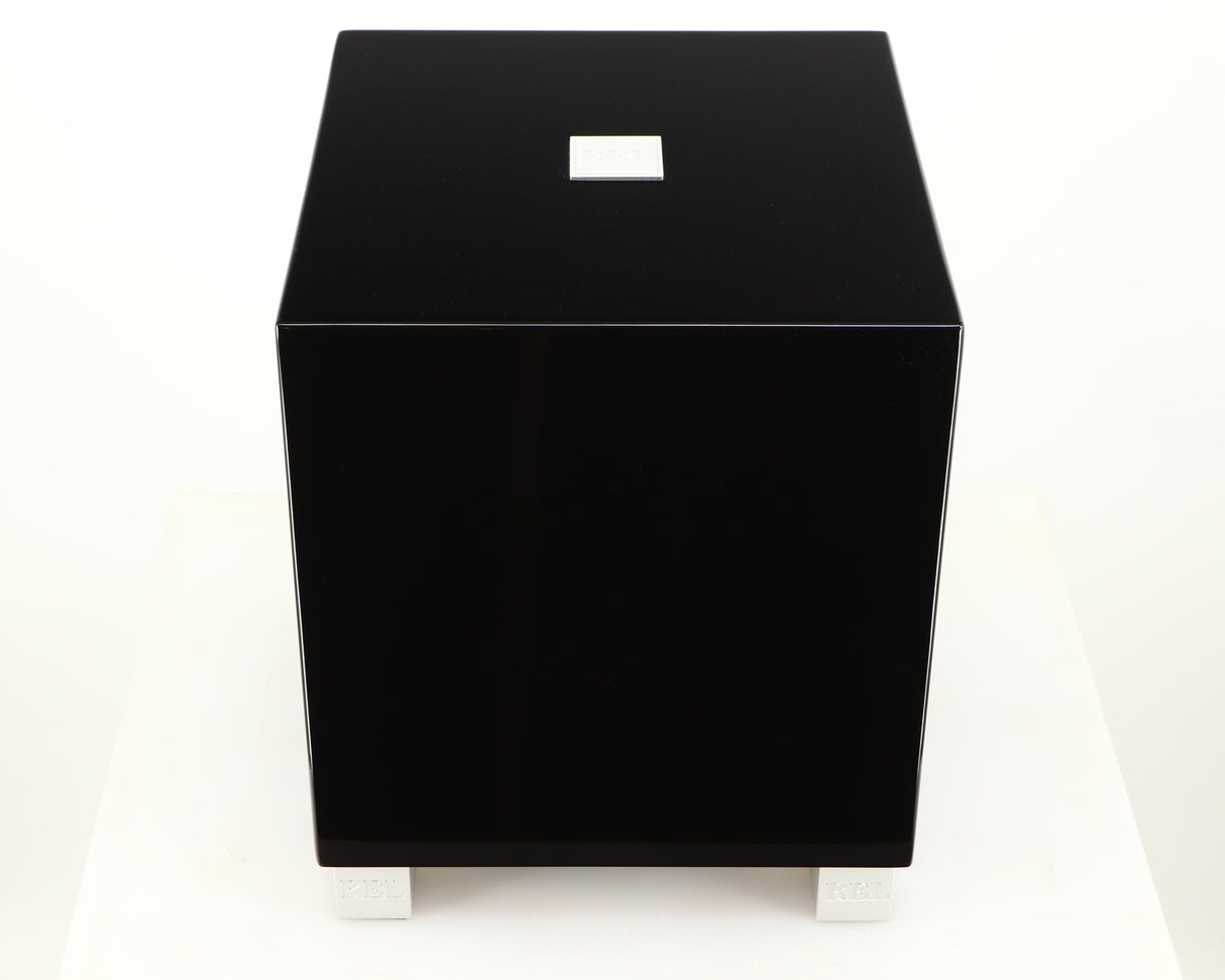 Top of a used REL T5i Subwoofer in a piano black finish