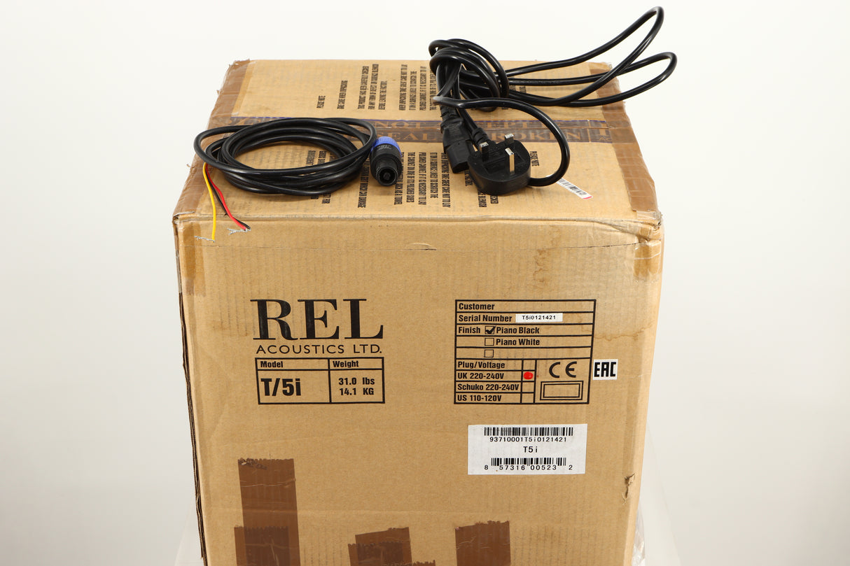 Box of a used REL T5i Subwoofer in Piano Black finish with Upgrade Feet