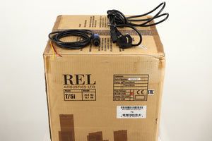 Box of a used REL T5i Subwoofer in Piano Black finish with Upgrade Feet
