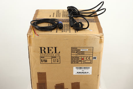Box of a used REL T5i Subwoofer in Piano Black finish with Upgrade Feet