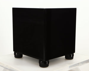 Front left corner of a used REL T5i Subwoofer W/ Upgraded Feet in a piano black finish