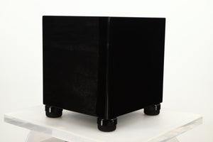 Front right corner view of a used REL T5i Subwoofer in Piano Black finish with Upgrade Feet
