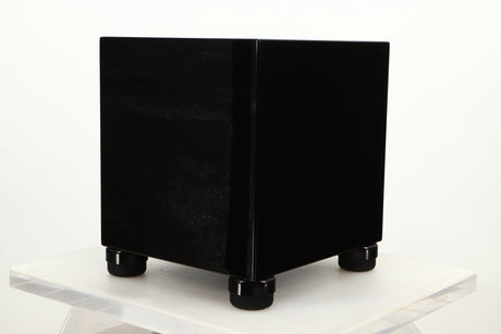 Front right corner view of a used REL T5i Subwoofer in Piano Black finish with Upgrade Feet
