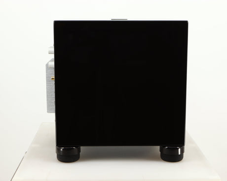 Left side view of a used REL T5i Subwoofer W/ Upgraded Feet in a piano black finish