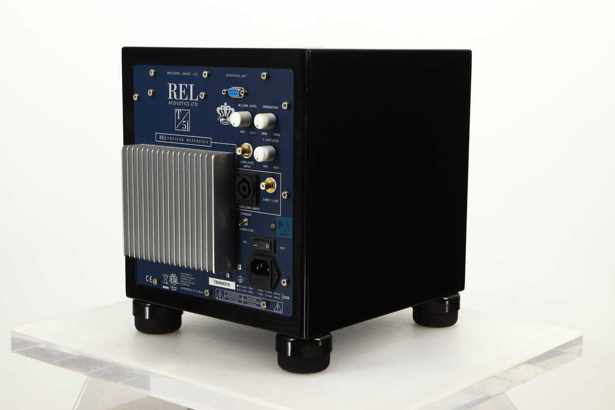 Rear right corner view of a used REL T5i Subwoofer in Piano Black finish with Upgrade Feet