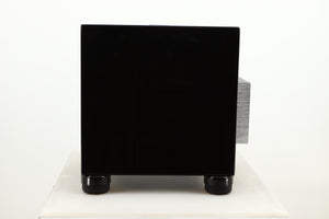 Side view of a used REL T5i Subwoofer in Piano Black finish with Upgrade Feet