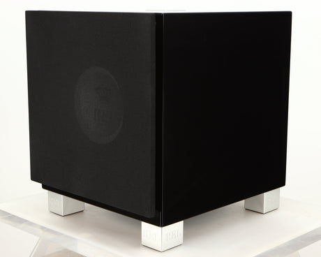 Front right corner of a used REL T7i Subwoofer in a piano black finish