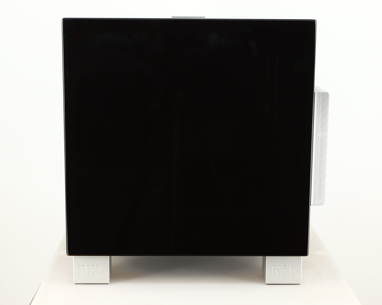 Right side view of a used REL T7i Subwoofer in a piano black finish