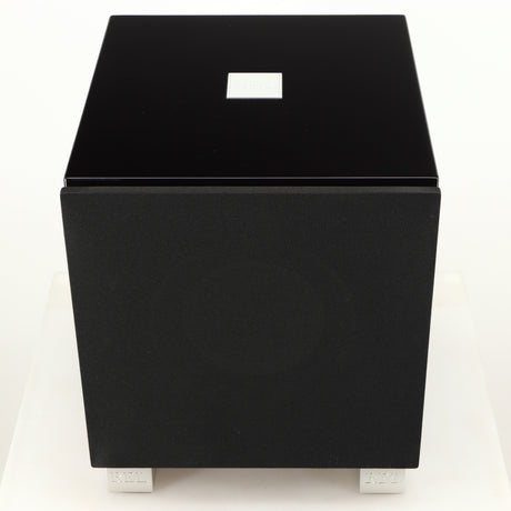 Top of a used REL T7i Subwoofer in a piano black finish