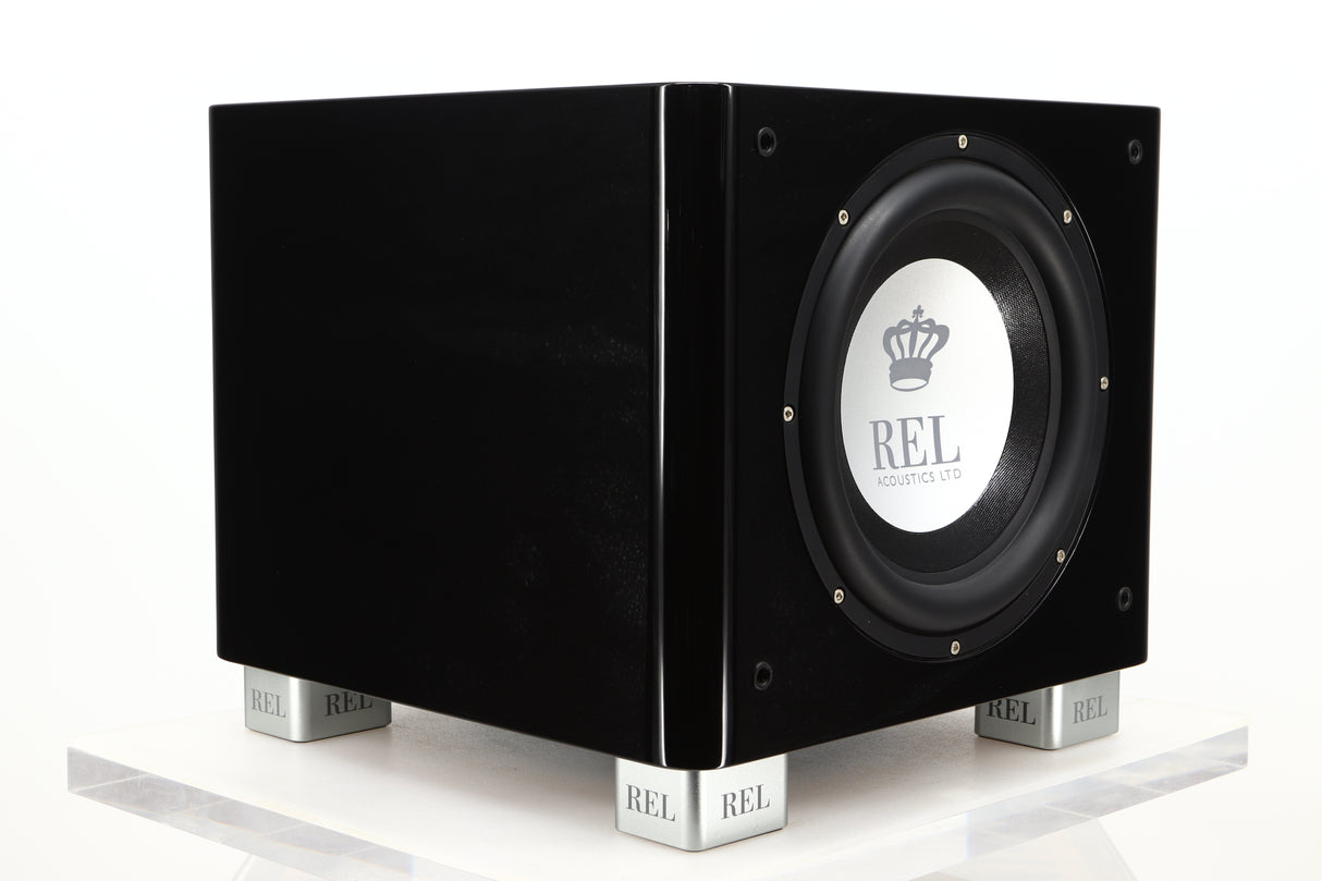 Front left corner view of a used REL T9X Subwoofer in Piano Black finish