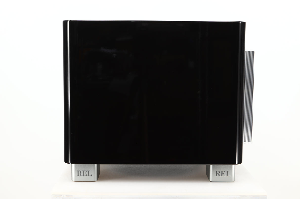 Side view of a used REL T9X Subwoofer in Piano Black finish