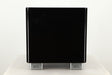 Front view of a used REL T5X Subwoofer in Piano Black finish