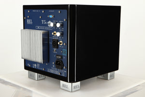 Rear right corner view of a used REL T5X Subwoofer in Piano Black finish