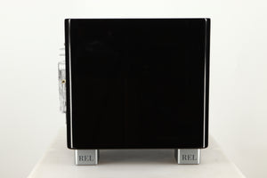 Side view of a used REL T5X Subwoofer in Piano Black finish