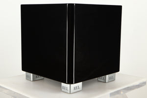 Front Left Corner view of a used REL T5X Subwoofer in Piano Black finish