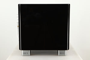 Side view of a used REL T5X Subwoofer in Piano Black finish