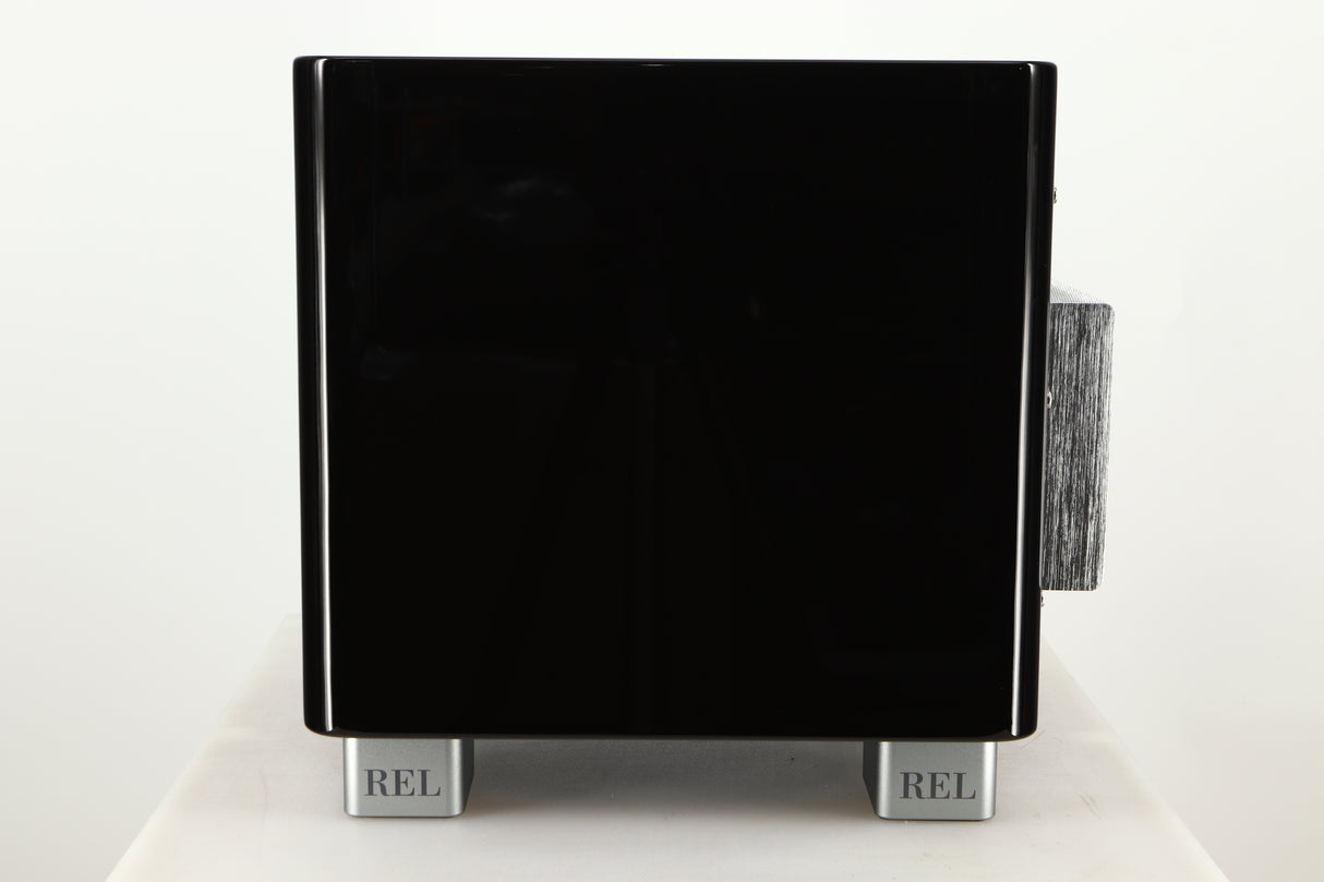 Side view of a used REL T5X Subwoofer in Piano Black finish