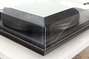 Front left corner of a used Revolver Rebel Turntable / AT95E Cartridge in a black finish