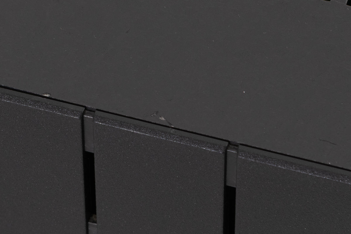 Close up of a used Revox B251 Integrated Amplifier showing scratches on top