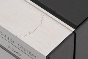 Close up of a used Revox B251 Integrated Amplifier showing scratch on top