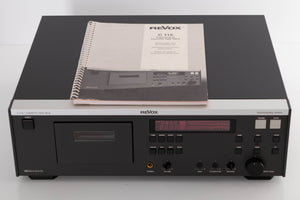 Top of a used Revox C115 Cassette Tape Deck in a Black finish showing Manual