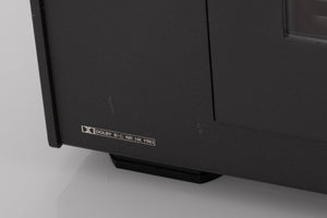 Close up of a used Revox C115 Cassette Tape Deck in a Black finish showing few light scratches on fascia