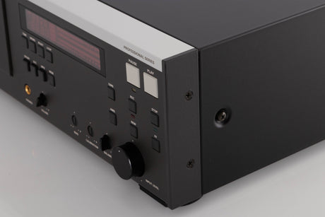 Front right corner of a used Revox C115 Cassette Tape Deck in a Black finish