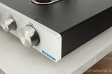 Front right corner view of a used Rogue Audio Metis Magnum Valve Pre Amplifier in Silver finish