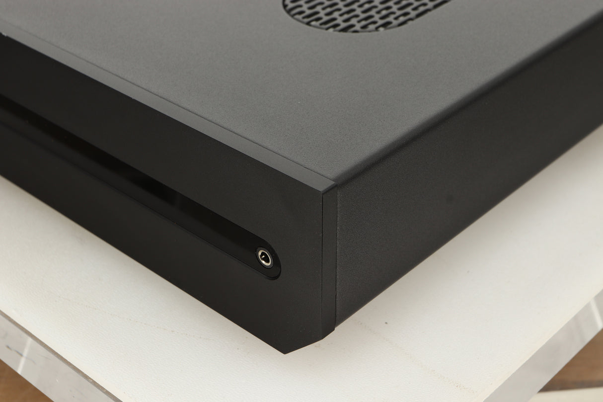 Front right corner view of a used Roksan Attessa Integrated Amplifier in Black finish 