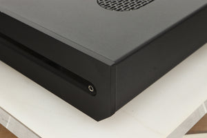 Front right corner view of a used Roksan Attessa Integrated Amplifier in Black finish 