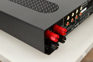 Rear left corner view of a used Roksan Attessa Integrated Amplifier in Black finish 